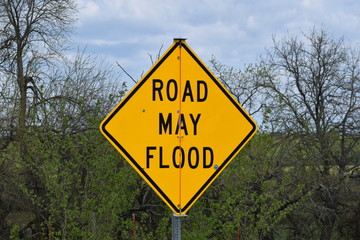 Road May Flood Sign