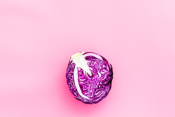 Red cabbage - head, cross section - on pink background top view space for text