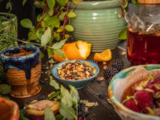 Preparation of the tea ceremony, tea in the bowl. Handmade cups