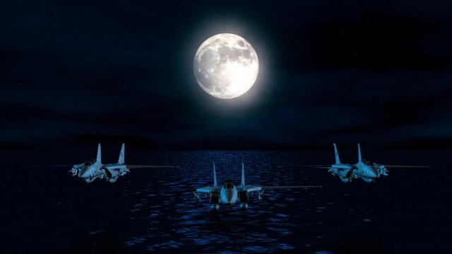Grumman F-14 Tomcat army Fighter jets flying low over the ocean at night.