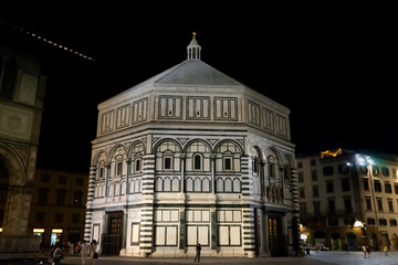 View of the famous baptistery of the city of Florence at night in Tuscany, Italy