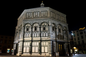 View of the famous baptistery of the city of Florence at night in Tuscany, Italy