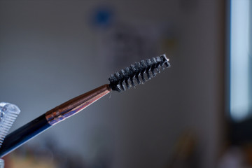 eyebrow brush with blur background