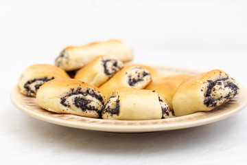 Poppy seeds cookies served on the plate