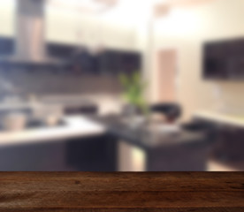 wood table on blur modern living room interior background - can used for display or montage your products