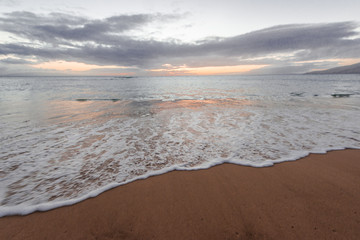 Fototapeta na wymiar Calm Surf on a Tropical Beach