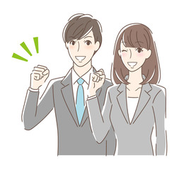 ガッツポーズするカップル