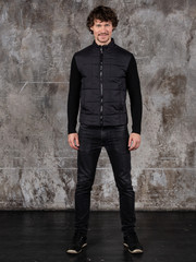 Full length studio portrait of attractive young man. Young Male Fashion Model Posing In Casual Outfit. 