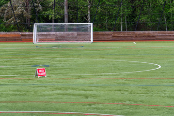 Field closed sign, athletic field closed due to coronavirus response
