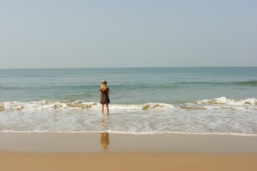 woman walking on the beach