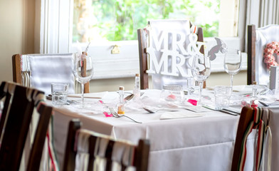 Groom and bride wedding table with decorations