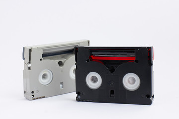 mini dv tapes on white background