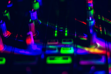 Macro shot of mixer section showing volume level indicator lights on Mobile DJ Controller