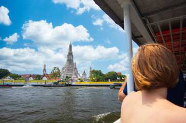 Passengers and traveller on transportation boat move to War Arun ,one of signature replace travel destination in Bangkok,Thailand