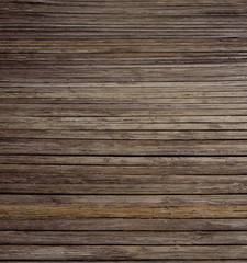 Obraz premium weathered wooden planks of seaside dock for background and texture