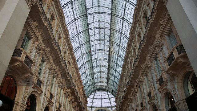 Galleria Vittorio Emanuele II in Milan, Italy. Exquisite architecture, the ceiling grid against birds