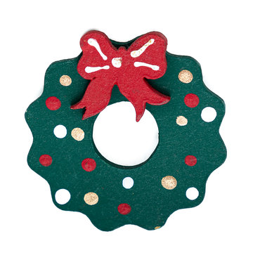 painted Unicel Christmas advent wreath on white background, decoration of wreath with red ribbon 