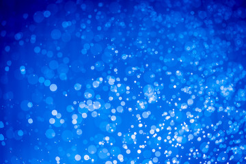 Abstract dark blue christmas glitter lights defocused bokeh