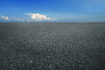 Asphalt road at sunny day. Empty asphalt highway with nice sky clouds.