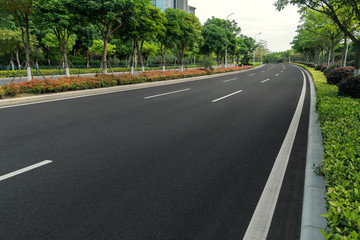 curve asphalt road in early morning city