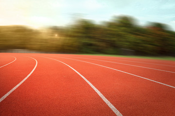 nobody running track for athletic competition, shallow depth of field race background for training