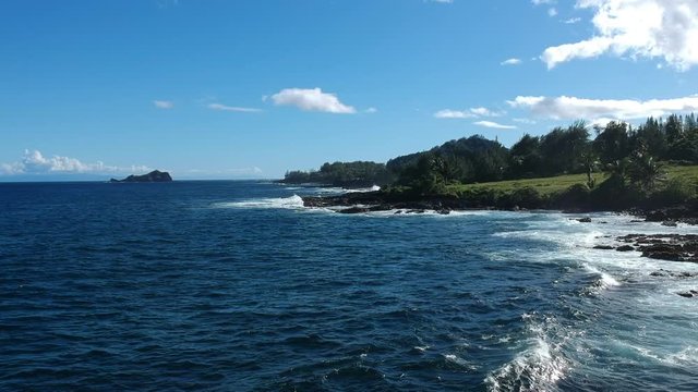 Rocky volcanic coastline of Hana Maui