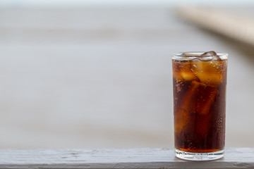 Cola with ice in the glass ready to drink for refresh