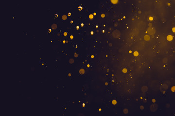 Dark Abstract Gold bokeh sparkle on black
