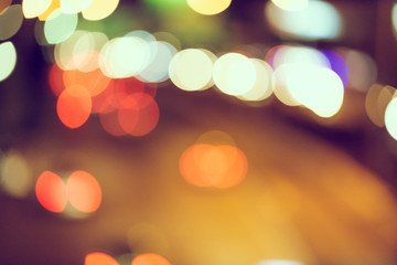 Abstract defocus of bokeh light traffic in the city