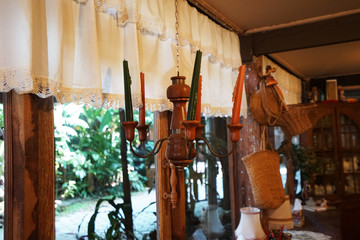 Interior design and decoration of coffee bar and bakery shop decorated with wooden furniture and antique props