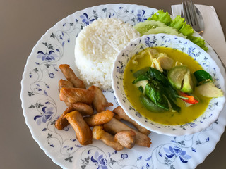 Fried pork rice and green curry with delicious Thai food