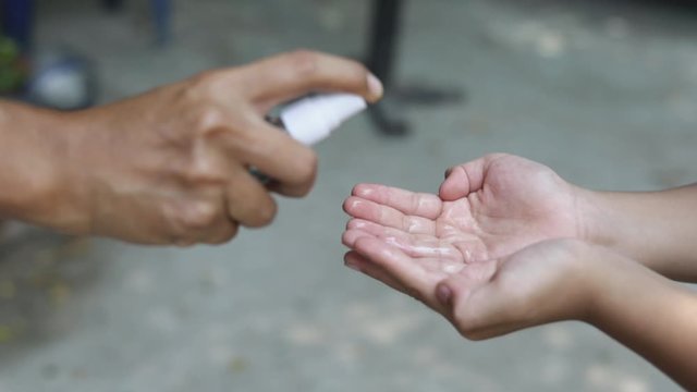 mother injected alcohol with the boy's hand to protect against the covid-19 virus.