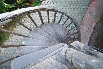 Close up design of old antique wooden spiral staircase