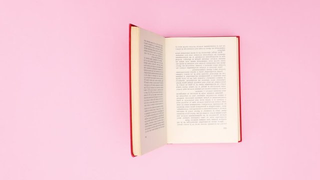  Red book appear and opens on pink background - Stop motion