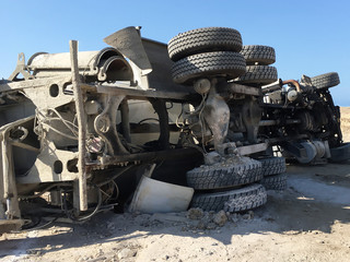 Truck cement mixer turned over. View of the bottom.