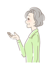 笑顔で手を差し出す女性の横顔