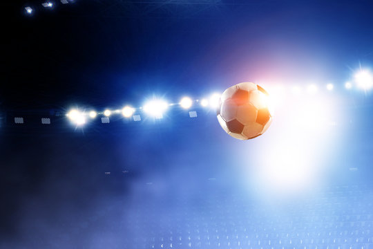 Soccer ball flight over stadium