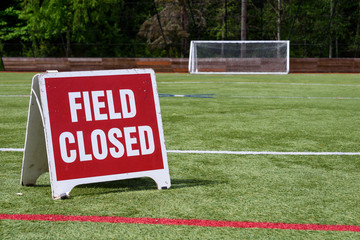Field closed sign, athletic field closed due to coronavirus response
