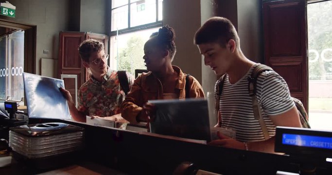 Students in record store shopping for vinyls