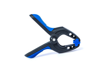 Black and blue spring clamp isolated on white background with clipping path.