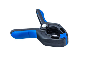 Obraz premium Black and blue spring clamp isolated on white background with clipping path.
