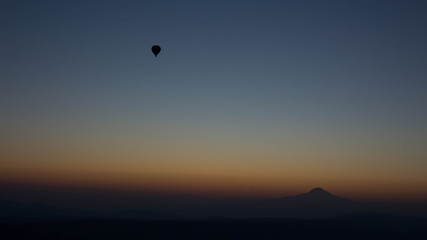 Hot Air balloon flying in Turkey Goreme Capadocia sky sunset sunrise