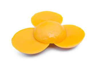 Yellow wax isolated on white background.