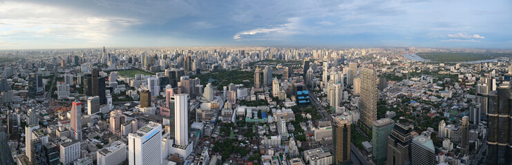 Fototapeta na wymiar 18 October 2019, Bangkok Thailand. Aerial Skyline Panorama of Bangkok Cityscape from Mahanakorn Skywalk. Super Beautiful. The New Observation Deck from The Tallest Building of Bangkok.
