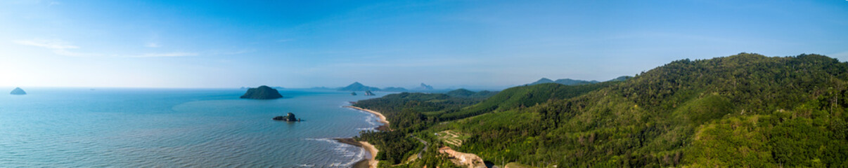 Fototapeta na wymiar The mountains and sea scenery with blue sky. seascape at sunny day on thailand. Panorama view
