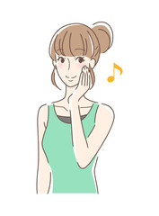 笑顔で頬を触る女性