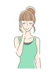 手の平で頬を触る女性