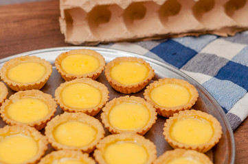 blurry delicious homemade pie susu or milk pie on wooden table 