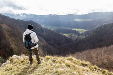 Fototapeta premium hiker on the top of a mountain