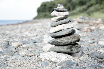 stack of stones on the beach in Samothraki, Greece. Holidays. Zen. Spa. Yoga. Summer. Beach.